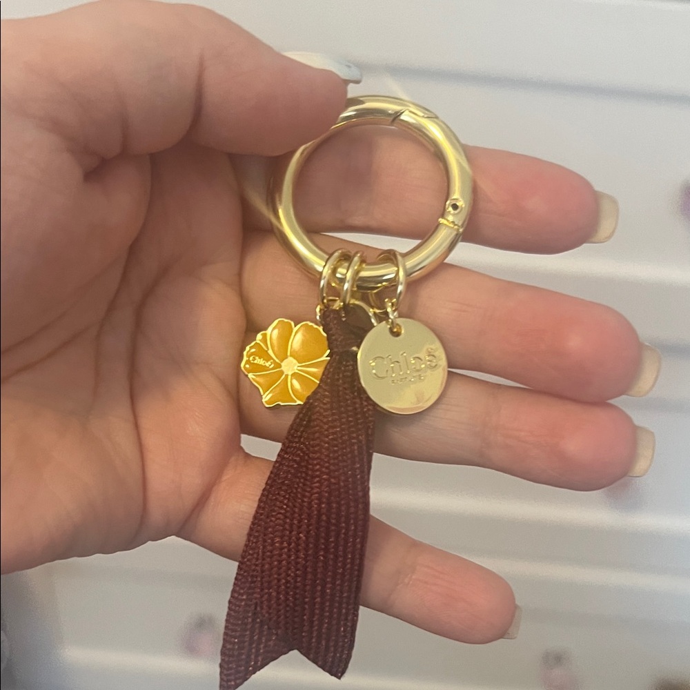 GWP/Novelty - Gold and Maroon Perfume Keychain